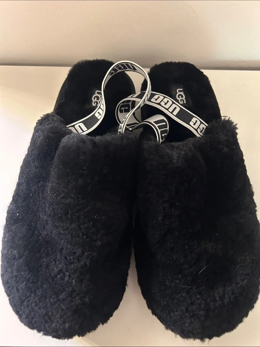 UGG Kids Black Fuzzy Slide with Branded White Strap